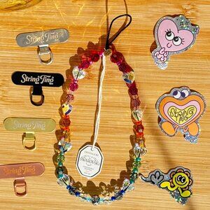 String Ting Love Song Swarovski Crystal Wristlet Phone Strap | Authentic
